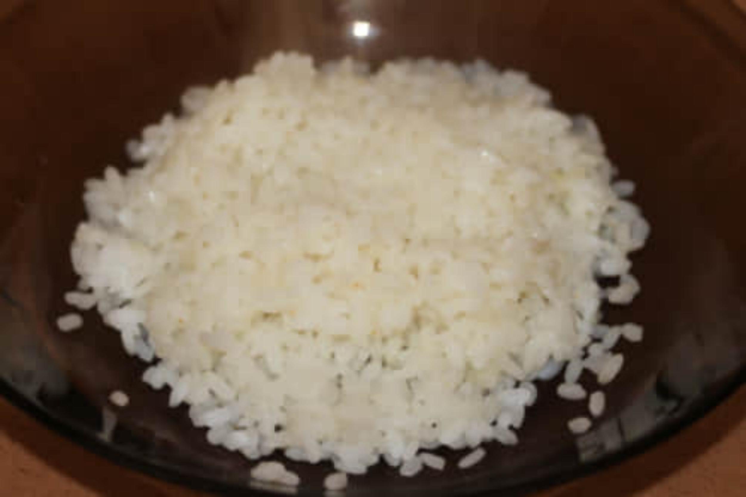 Рис отварить почти до готовности