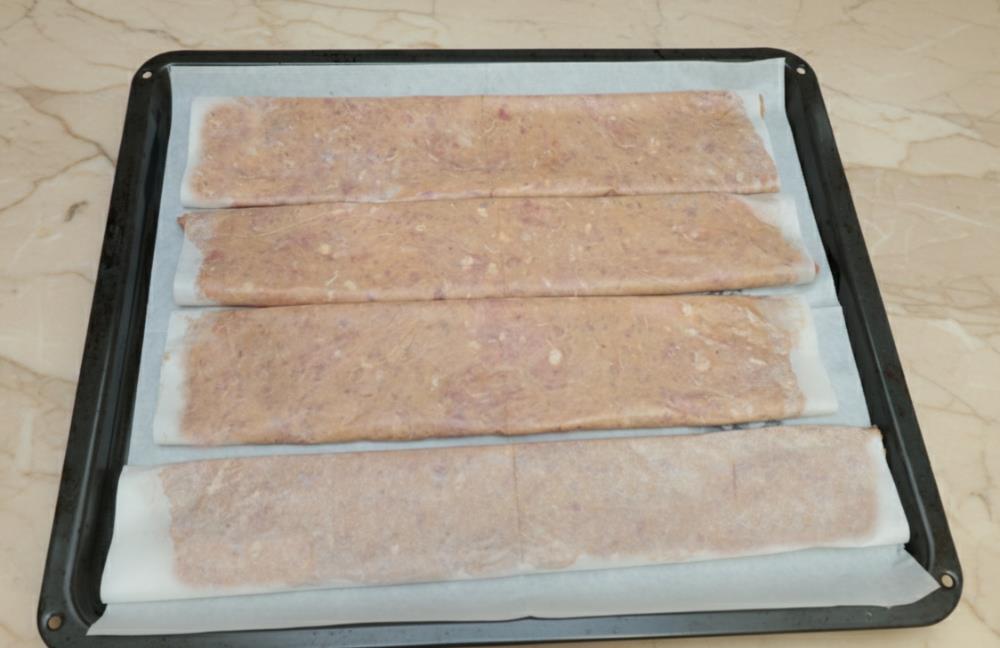 Переложить на противень и запечь