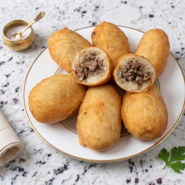 Пышные жареные пирожки с вареным мясом